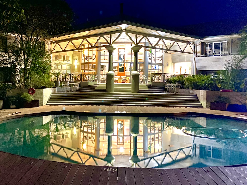 swimming pool beside house