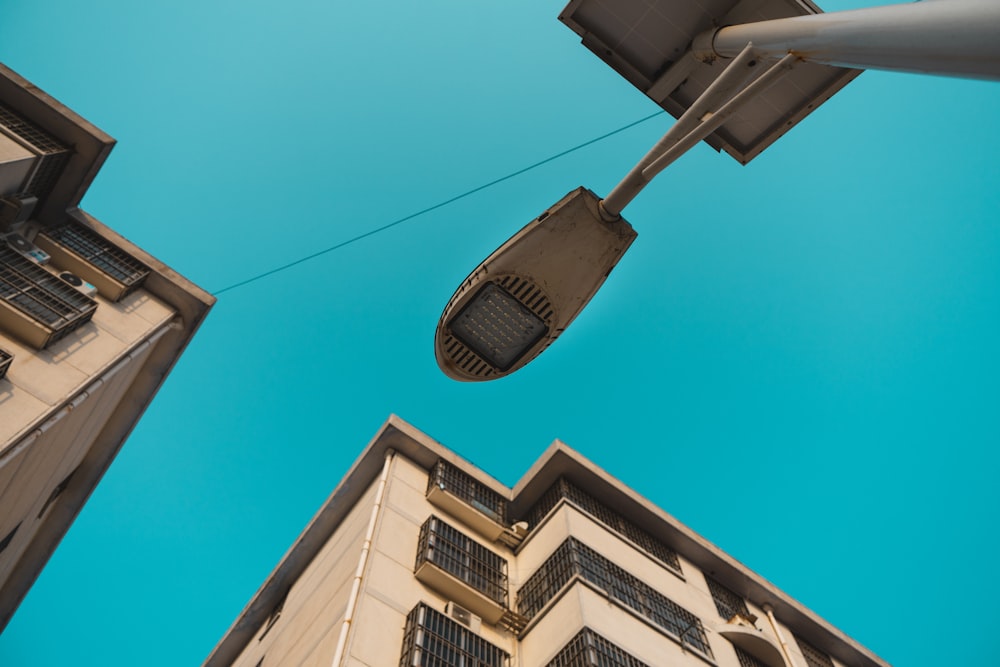 low-angle photography of lamp post during daytime