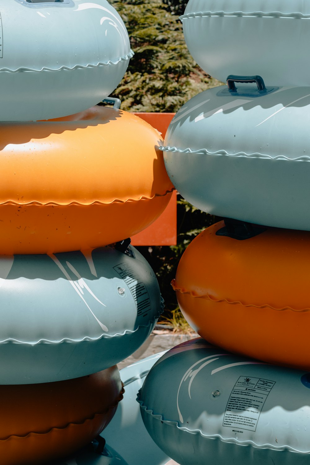a bunch of inflatable floats stacked on top of each other