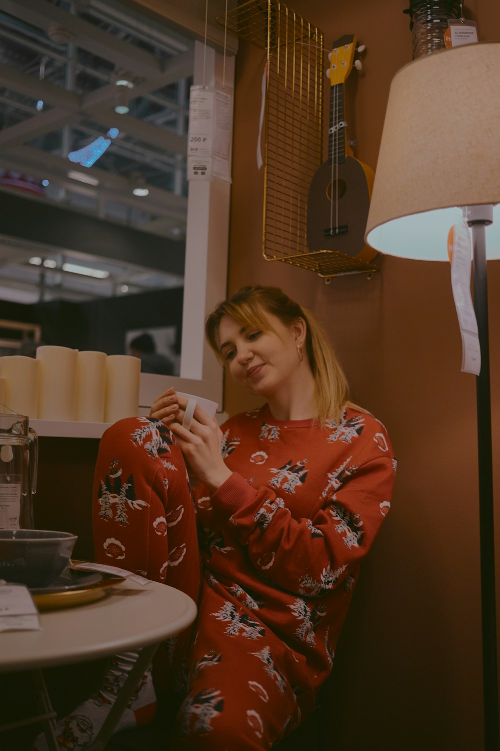 woman sitting in front of table