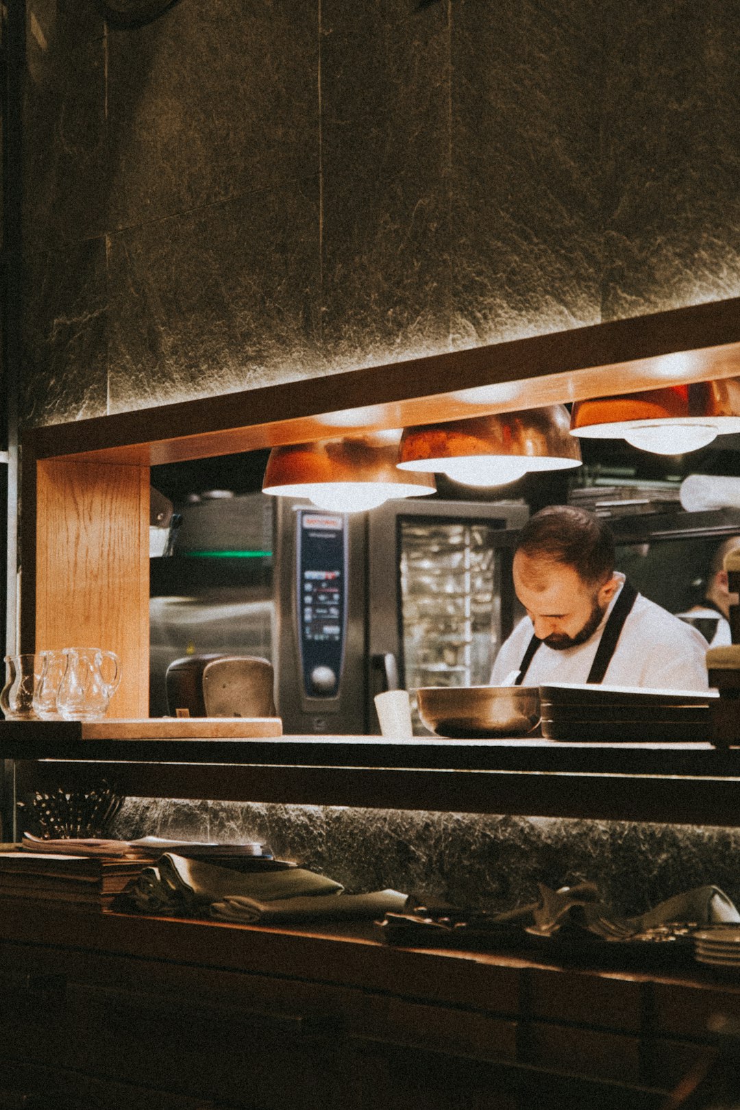 man standing in kitchen