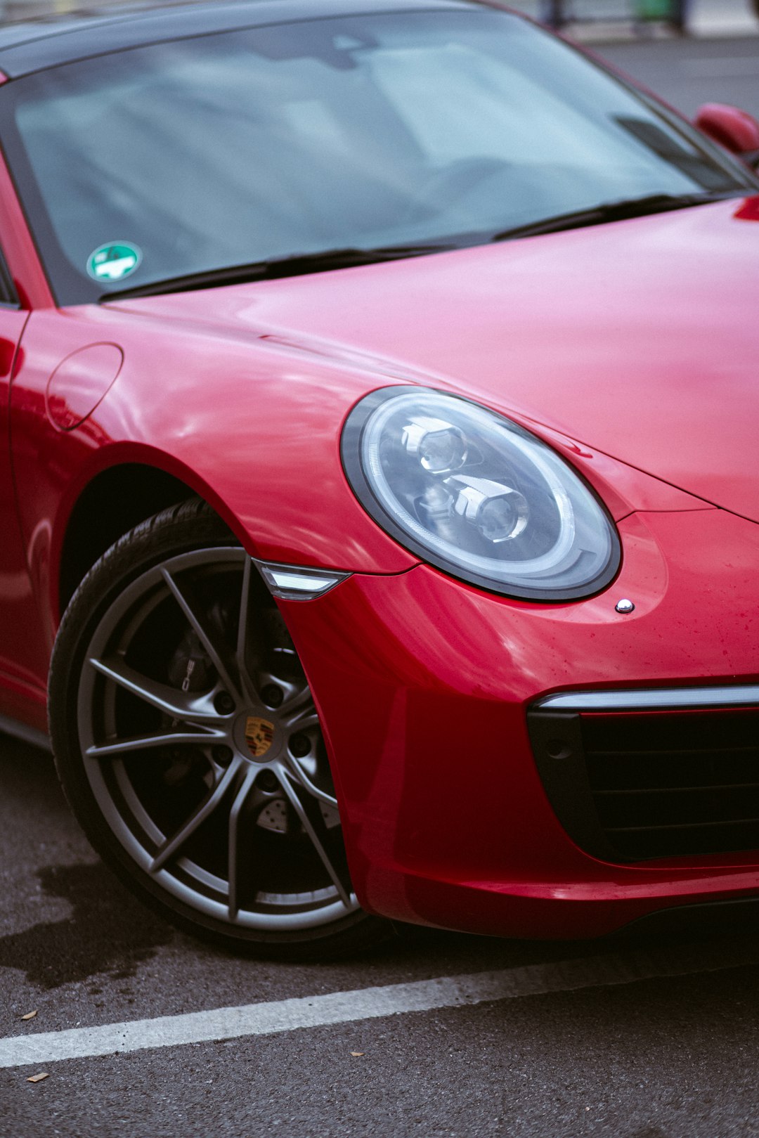 shallow focus photo of red car