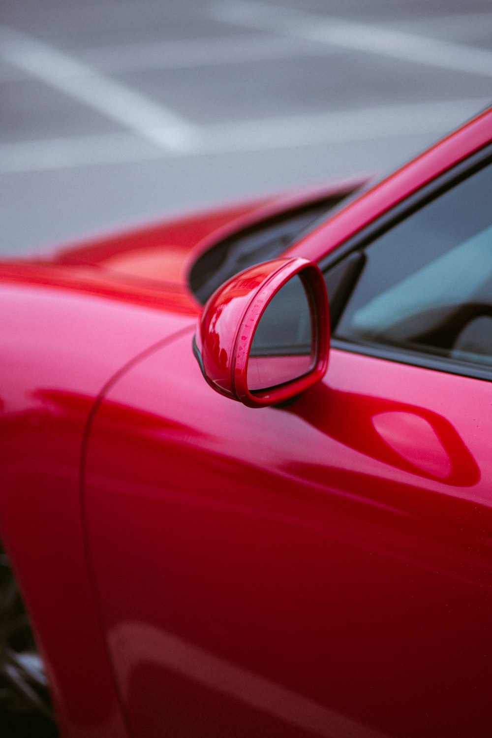 shallow focus photo of red car