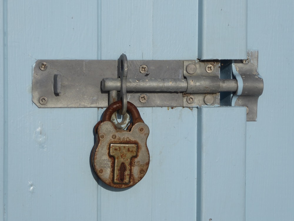 brown and grey padlock