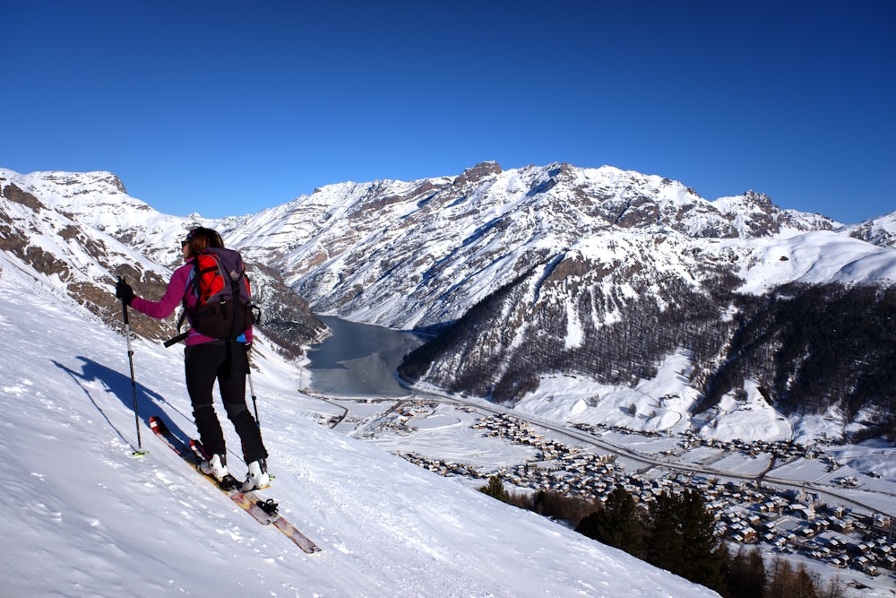 woman on mountain covered by snow