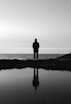 person standing in front of sea