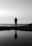 person standing in front of sea