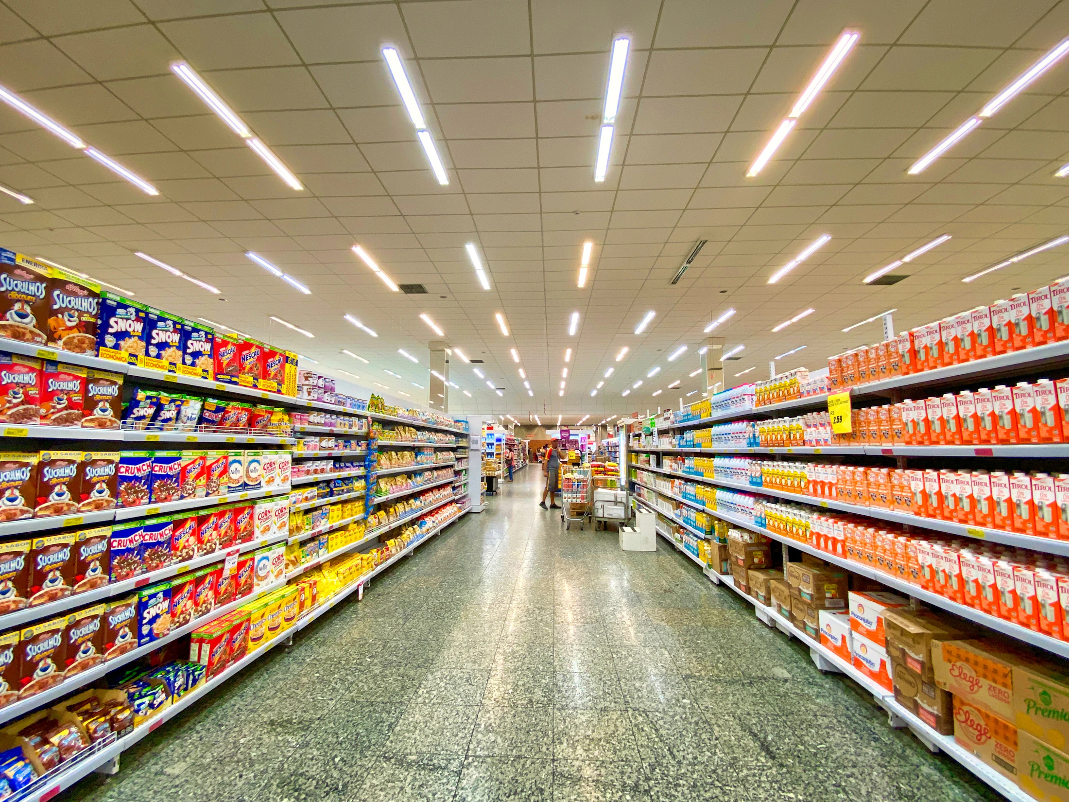 A colorful retail aisle filled with everyday products