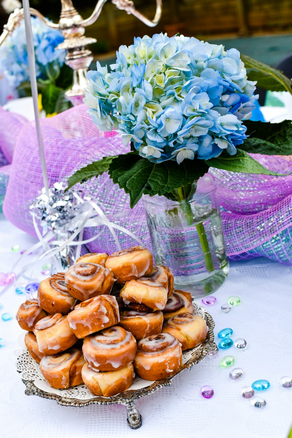 a plate of doughnuts sitting on a table