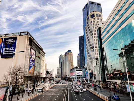 city street in between of high-rise buildings in Tianjin China