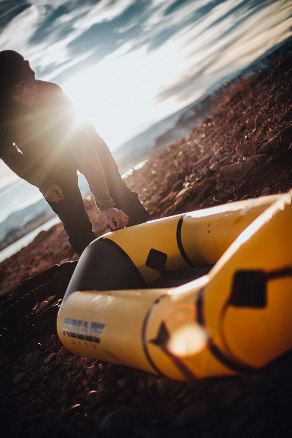 woman near yellow water raft