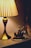 A beautifully lit 3D lamp showcasing a sacred temple design on a wooden table.