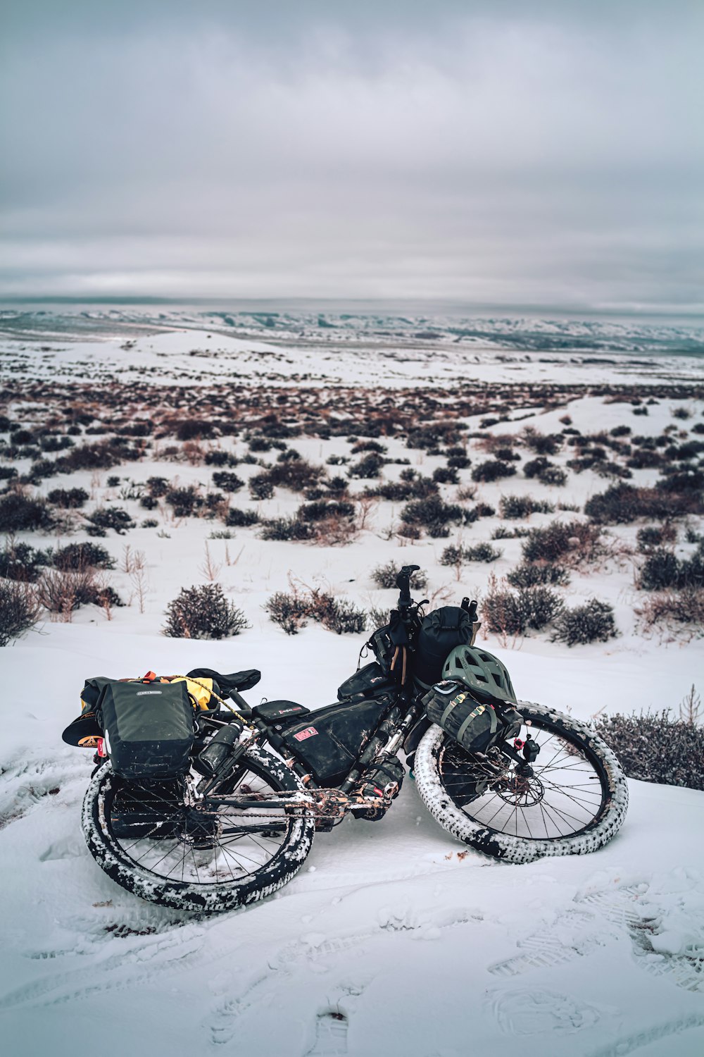 black bicycle on snow