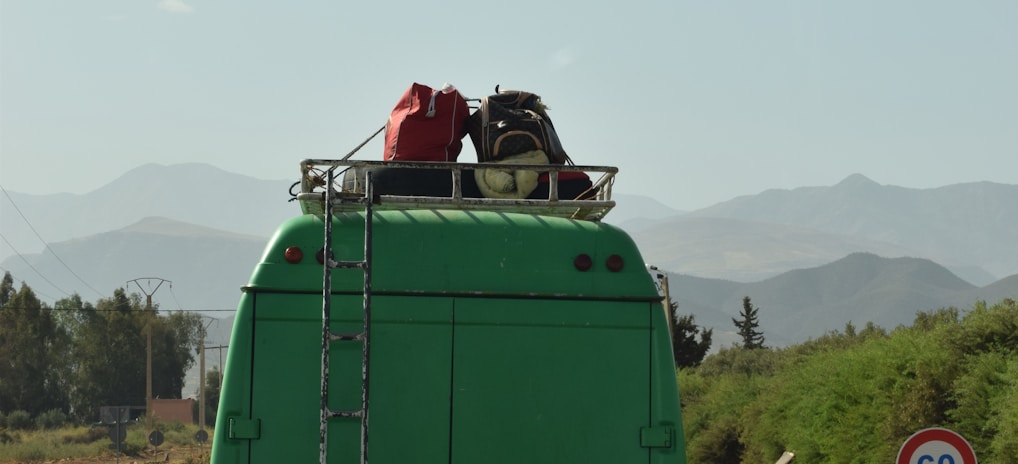 green and white van on road