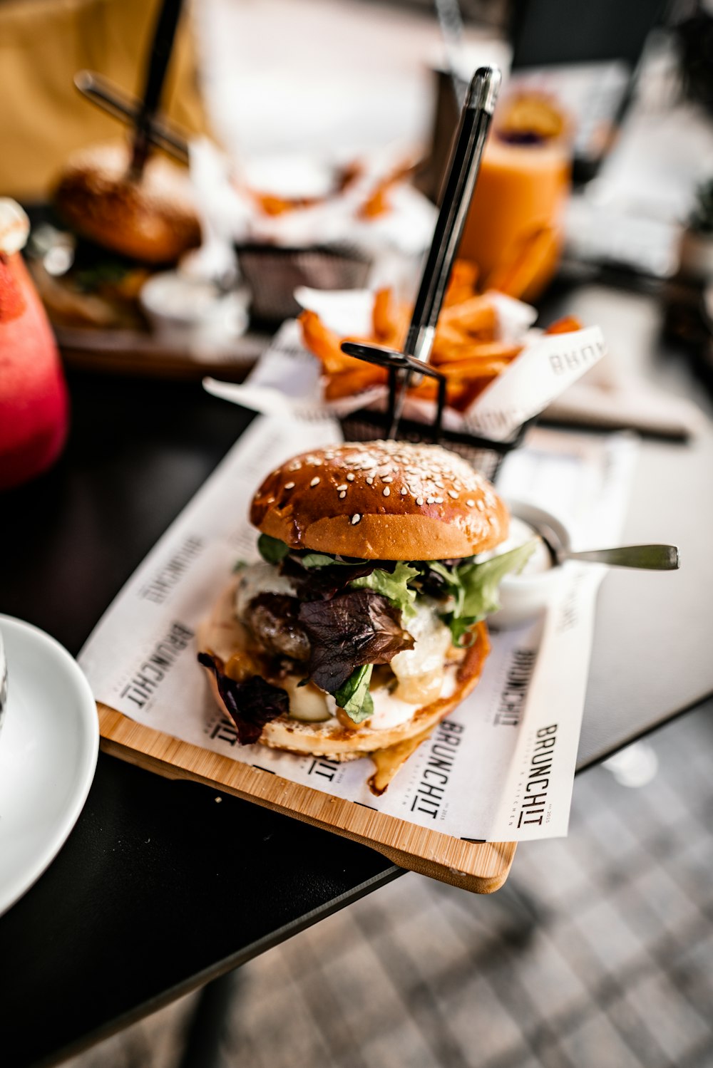 burger and fries on tray