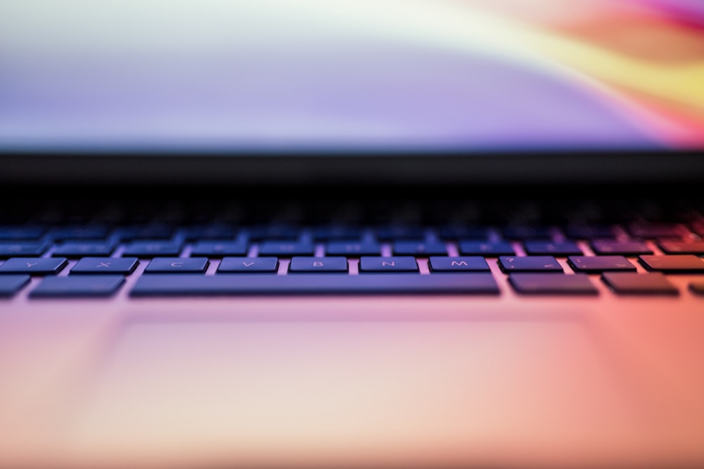 a close up of a laptop computer keyboard