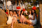 group of women sitting outdoors