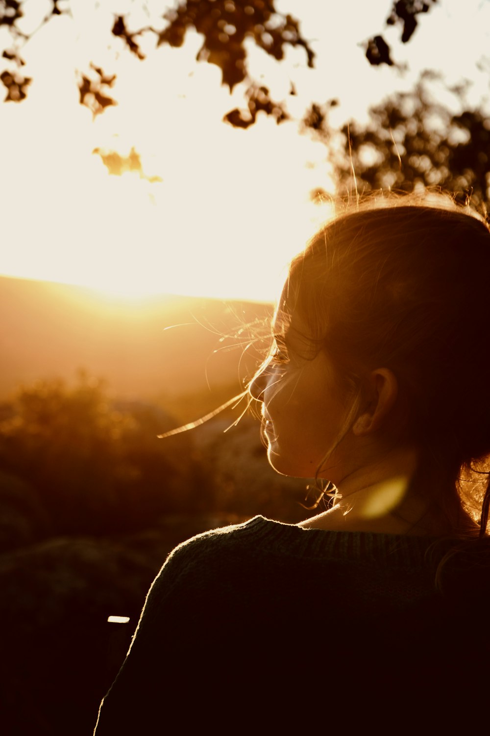 woman facing sideways outdoors