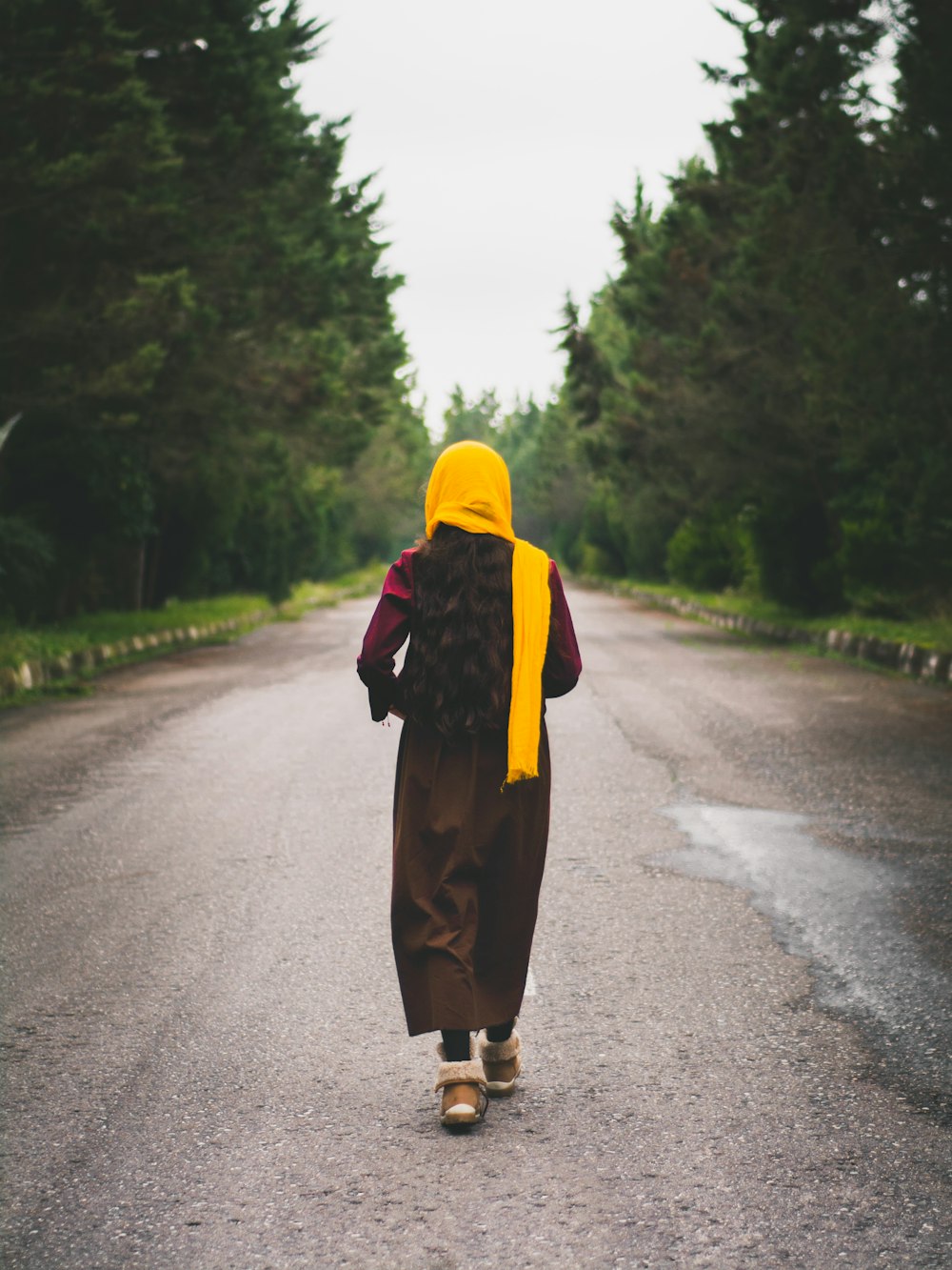 woman walking on road