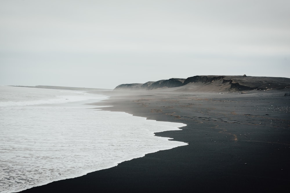 beach line under gray sky