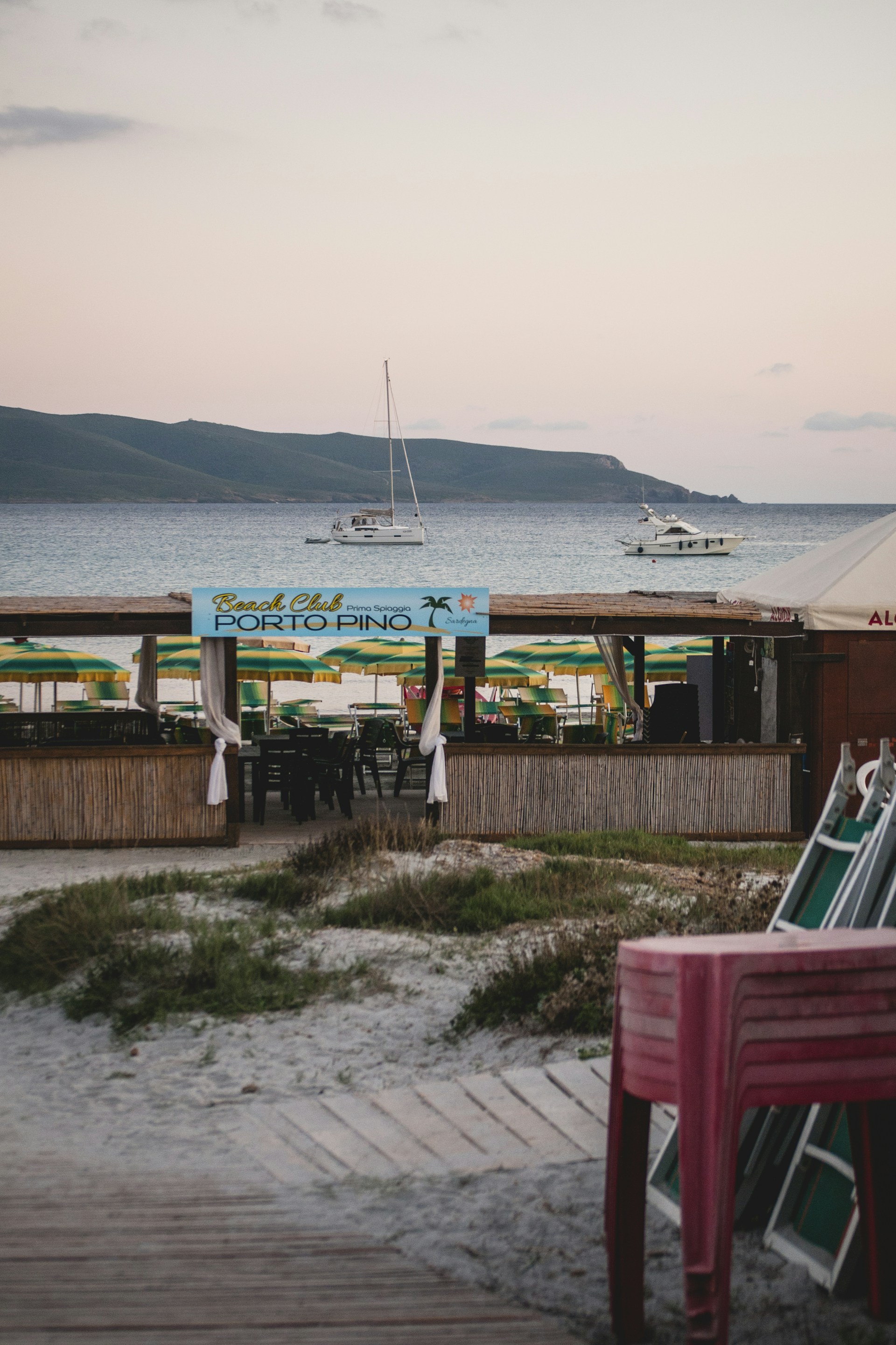 woman wearing yellow long-sleeved dress under white clouds and blue sky during daytime