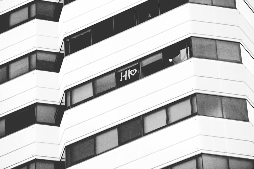 grayscale photography of high-rise building