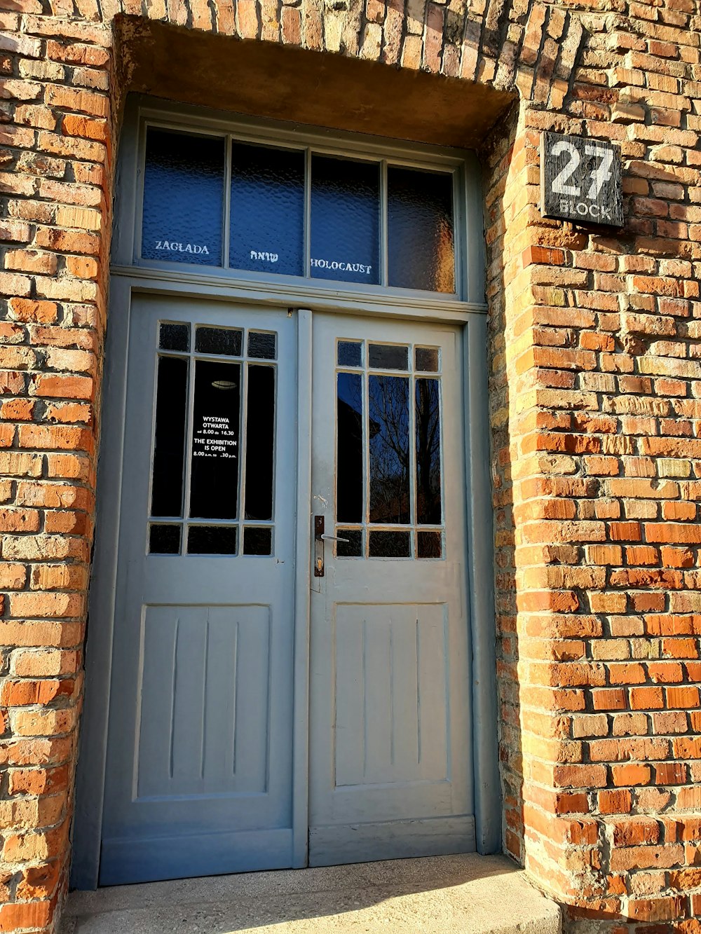 closed blue wooden doors