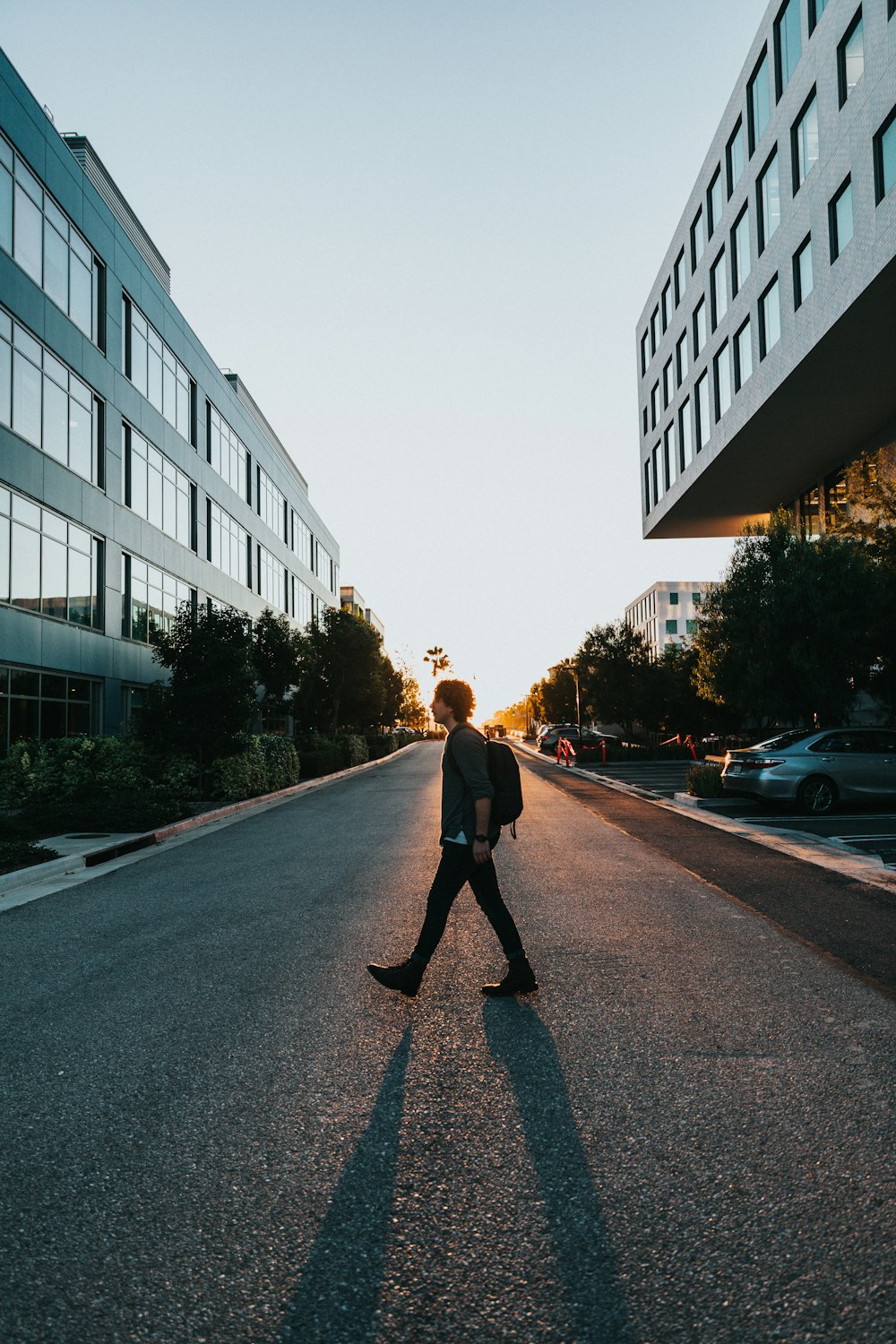 man walking on the road