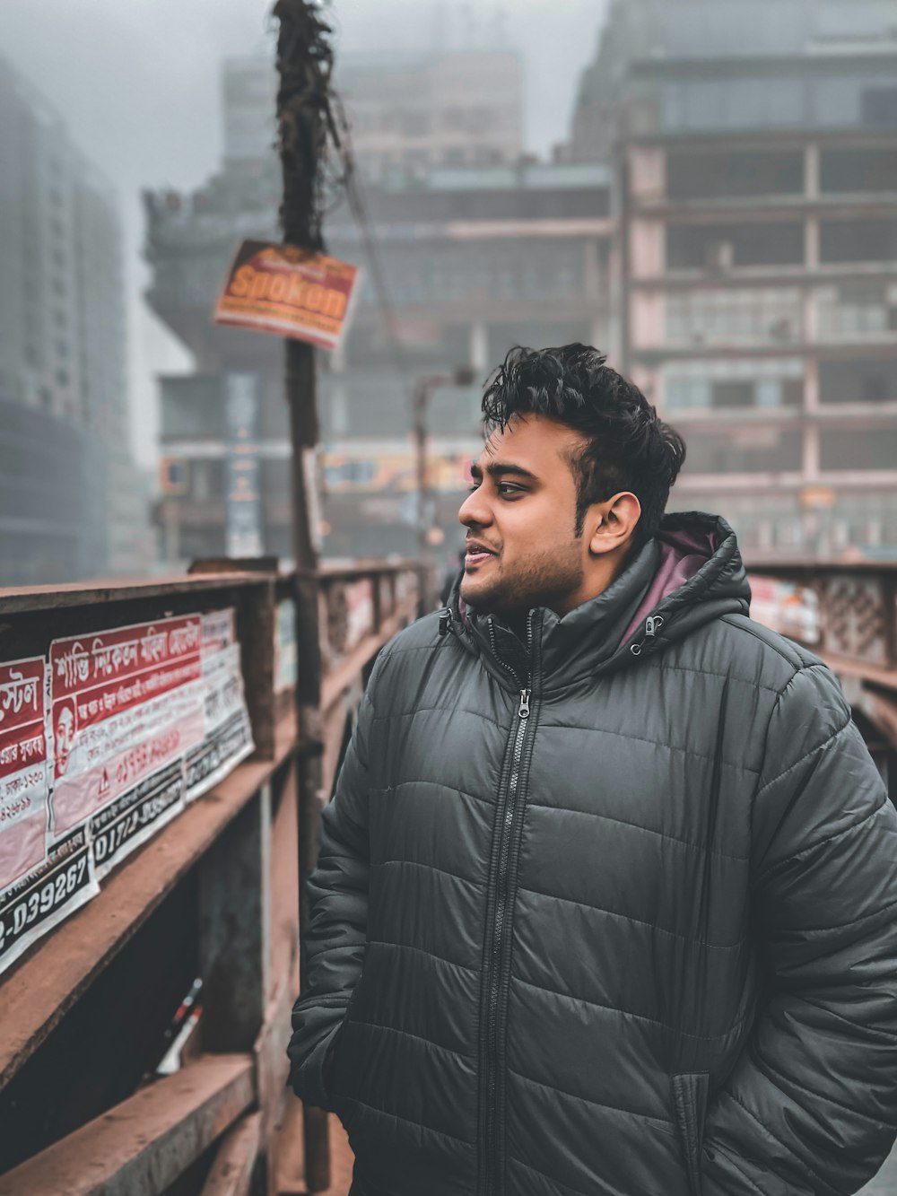 man wearing black bubble zip-up jacket