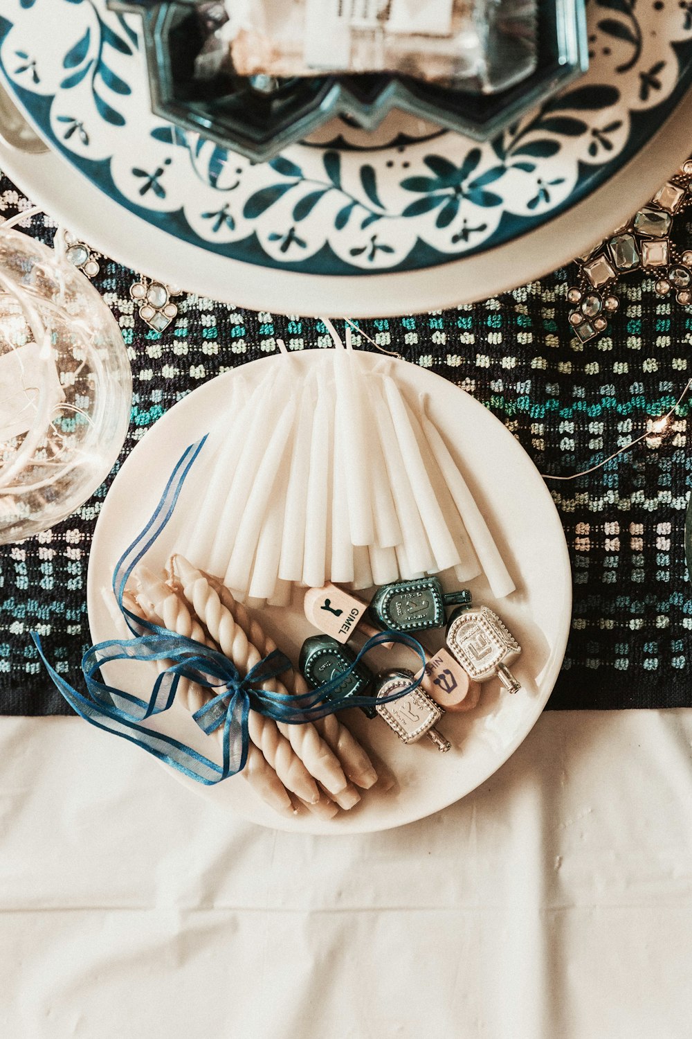 white candles on plate