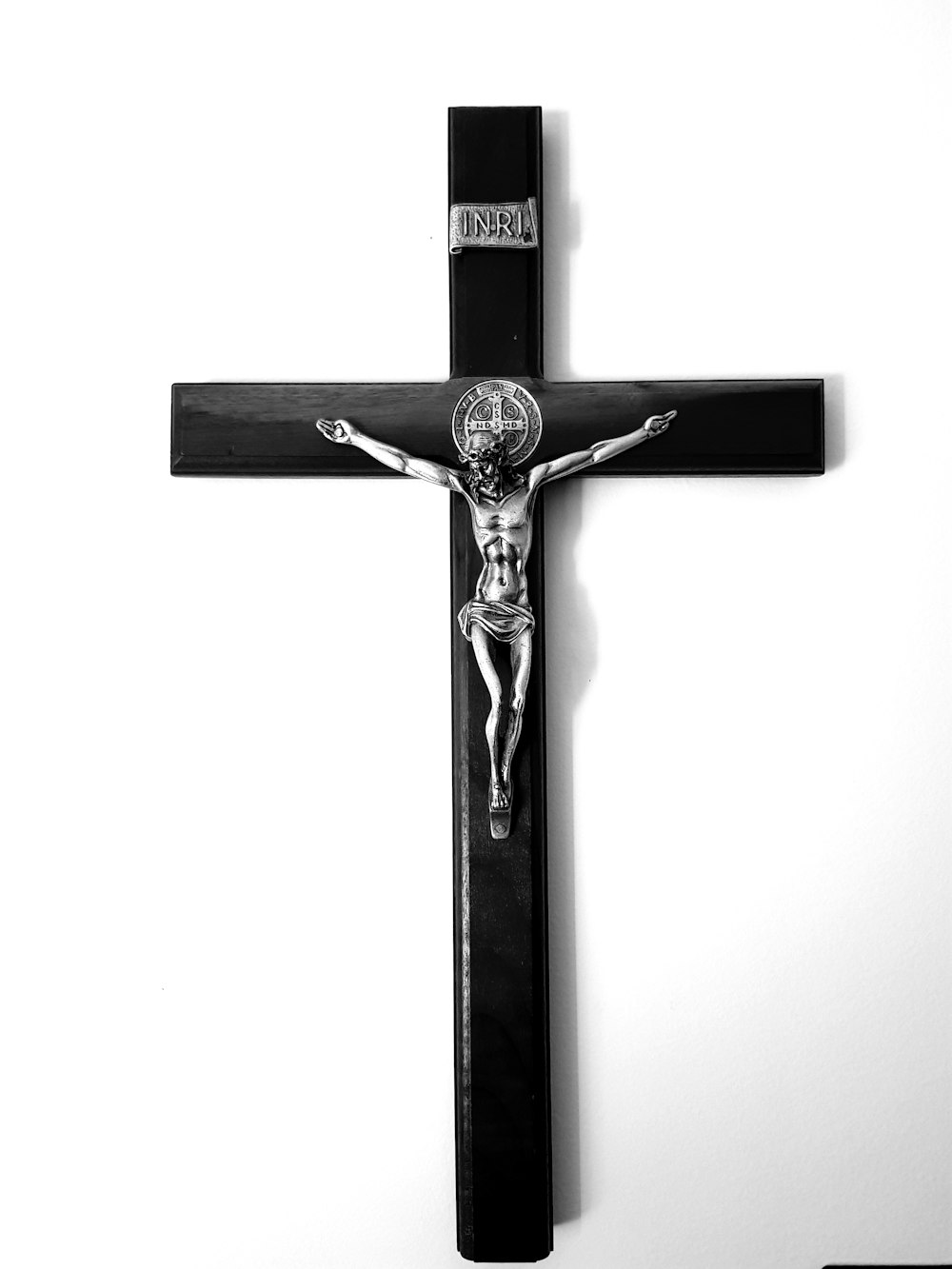 black and silver-colored crucifix