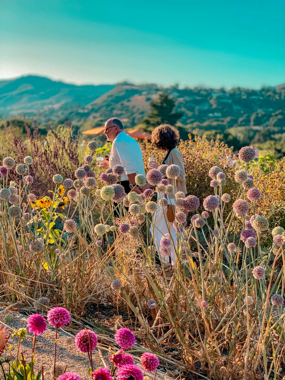 man and woman walking outdoors