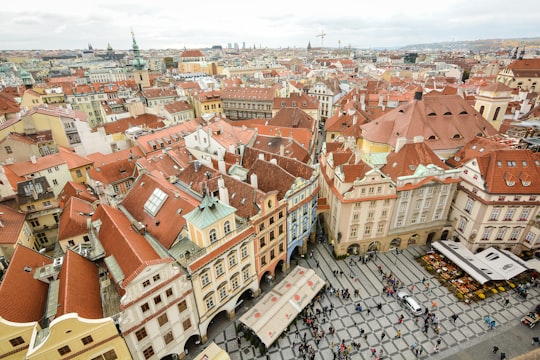 buildings and people during day in Old Town Square Czech Republic