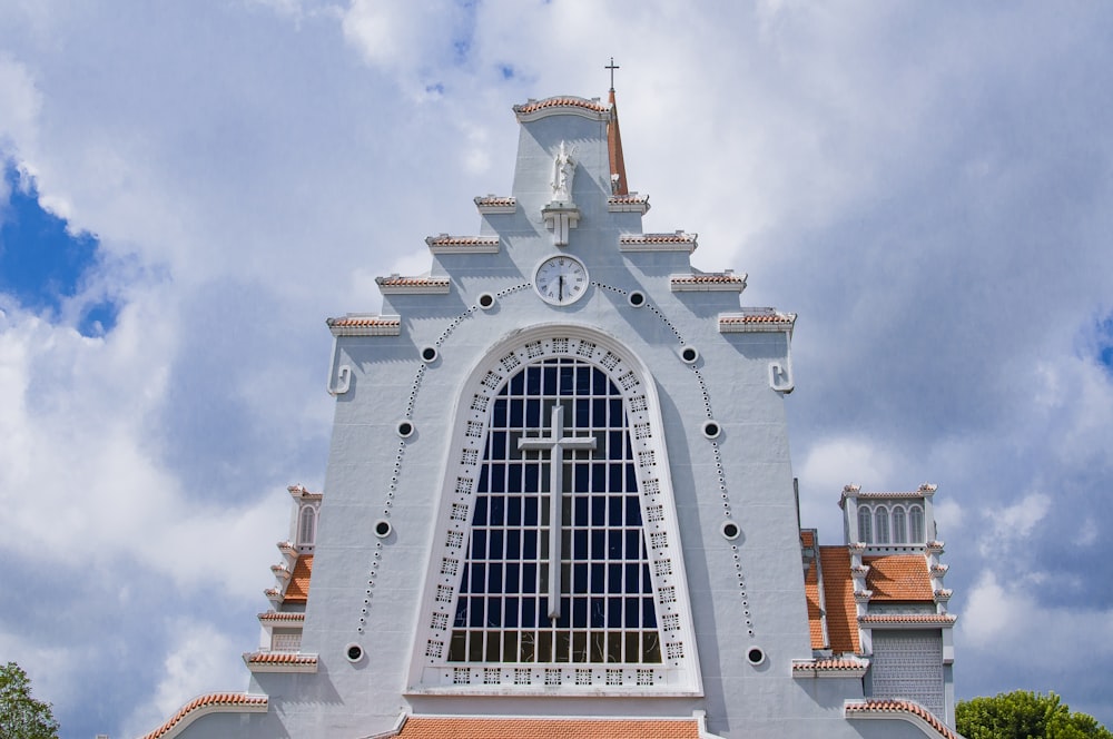 close-up photography of white church during daytime
