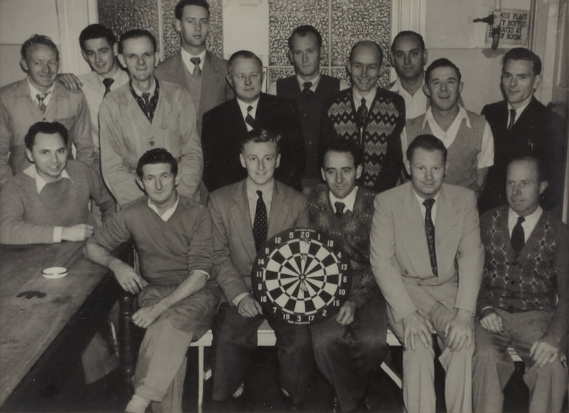 Holding dartboard at event
