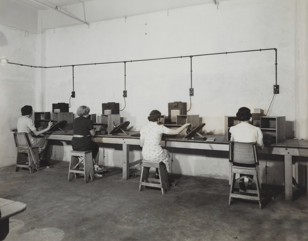 woman sitting in front of desk