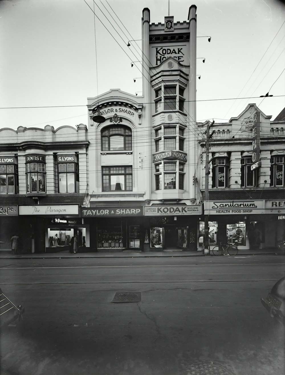 grayscale photography of Kodak building