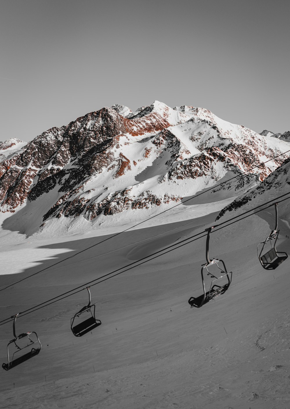 cable car above snow field