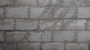 Close-up of brickwork and masonry on a recently finished wall