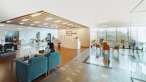 unknown person sitting on blue couch