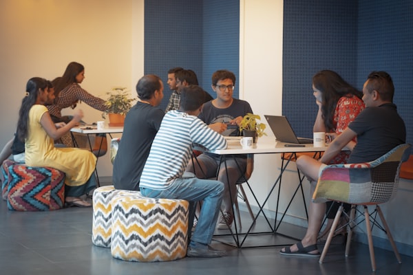 WebPro Arts India design team reviewing UI mockups