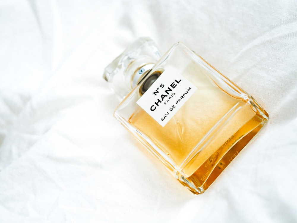 N5 Chanel bottle on white surface photo – Free Paris Image on Unsplash