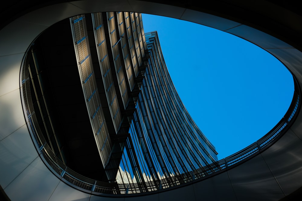 architectural photography of gray and blue concrete building