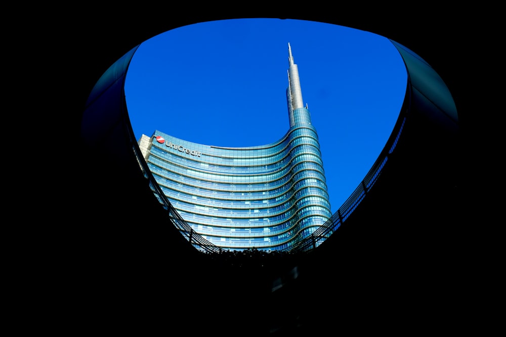 architectural photography of gray and blue concrete building