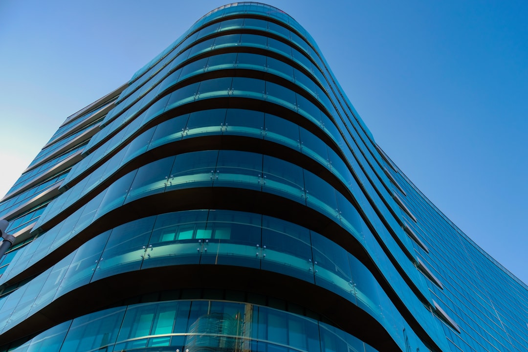 architectural photograph of black and blue concrete building