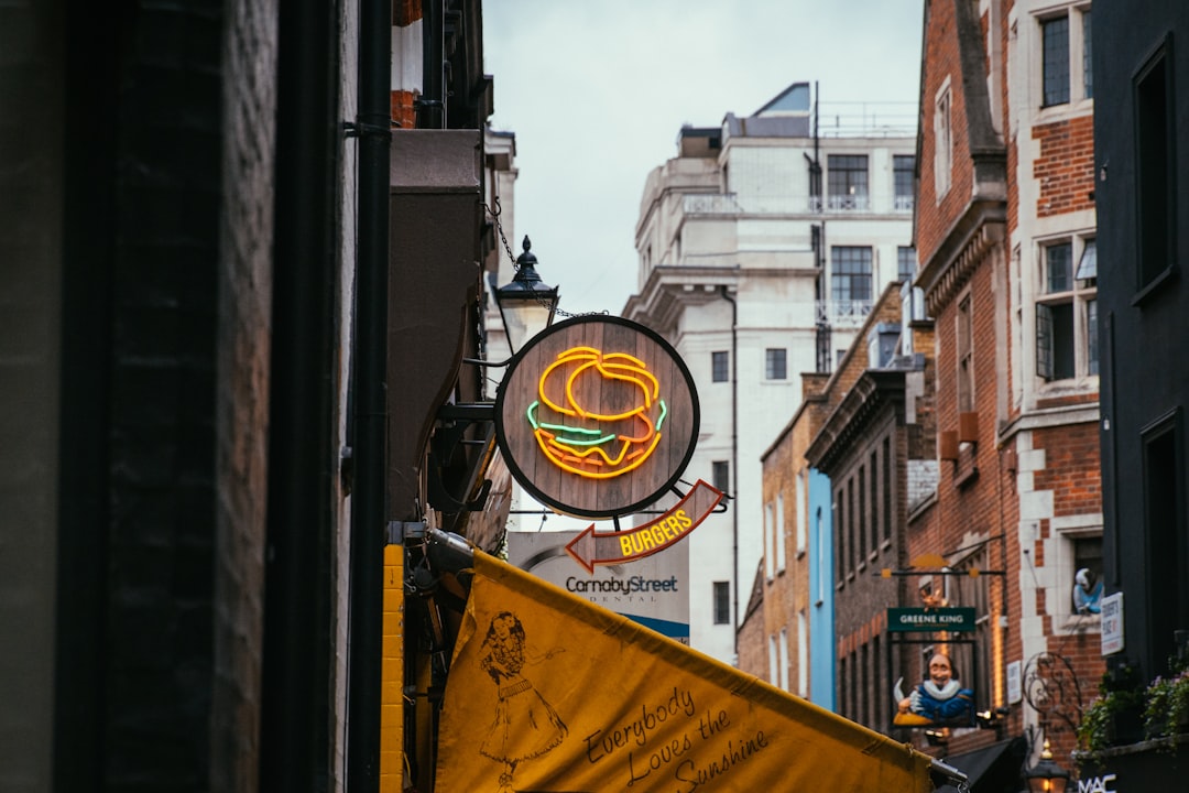 restaurant signage beside wall