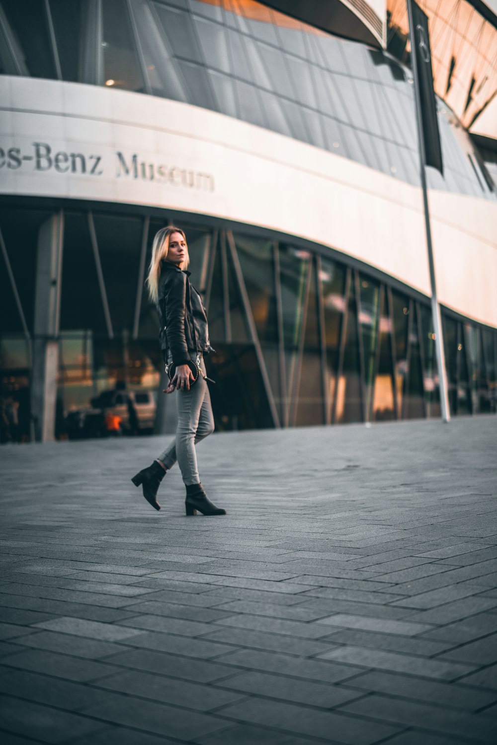 woman in black leather jacket