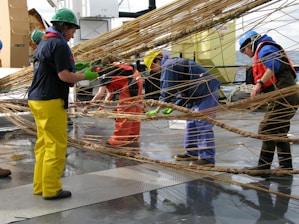 people working on brown rope