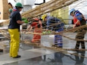 people working on brown rope
