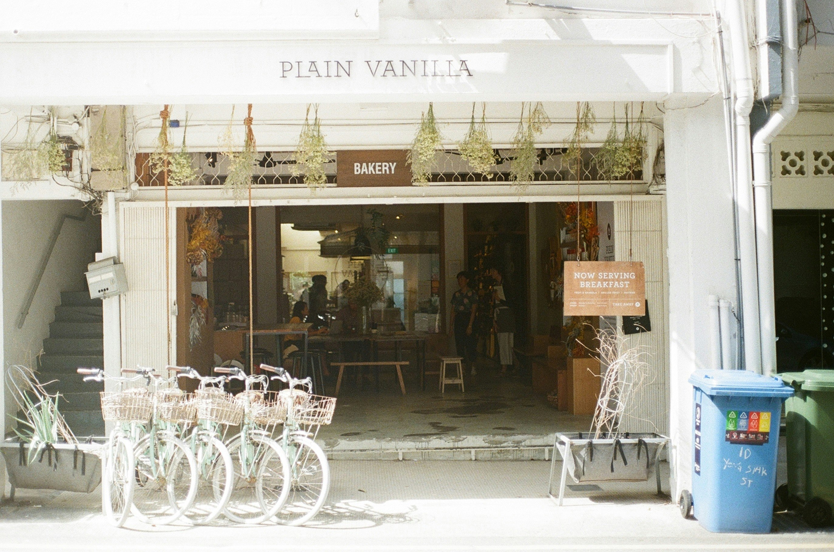 bicycle parked near storefront